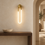 Cira brass wall light in a contemporary interior – image 4